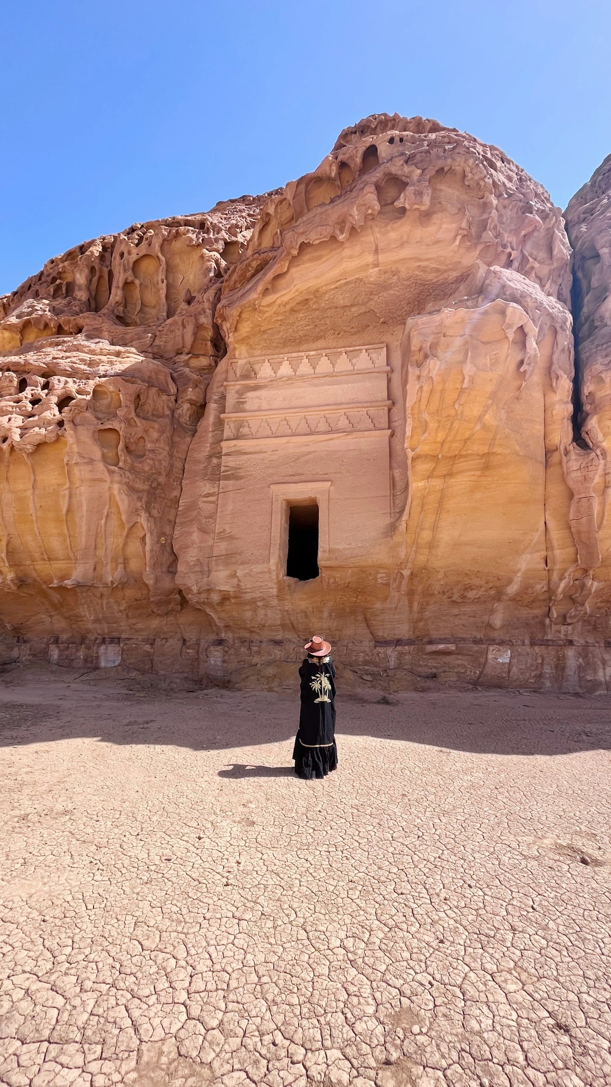 AlUla sandstone landscape with ancient rock formations and oasis palm groves in northwestern Saudi Arabia