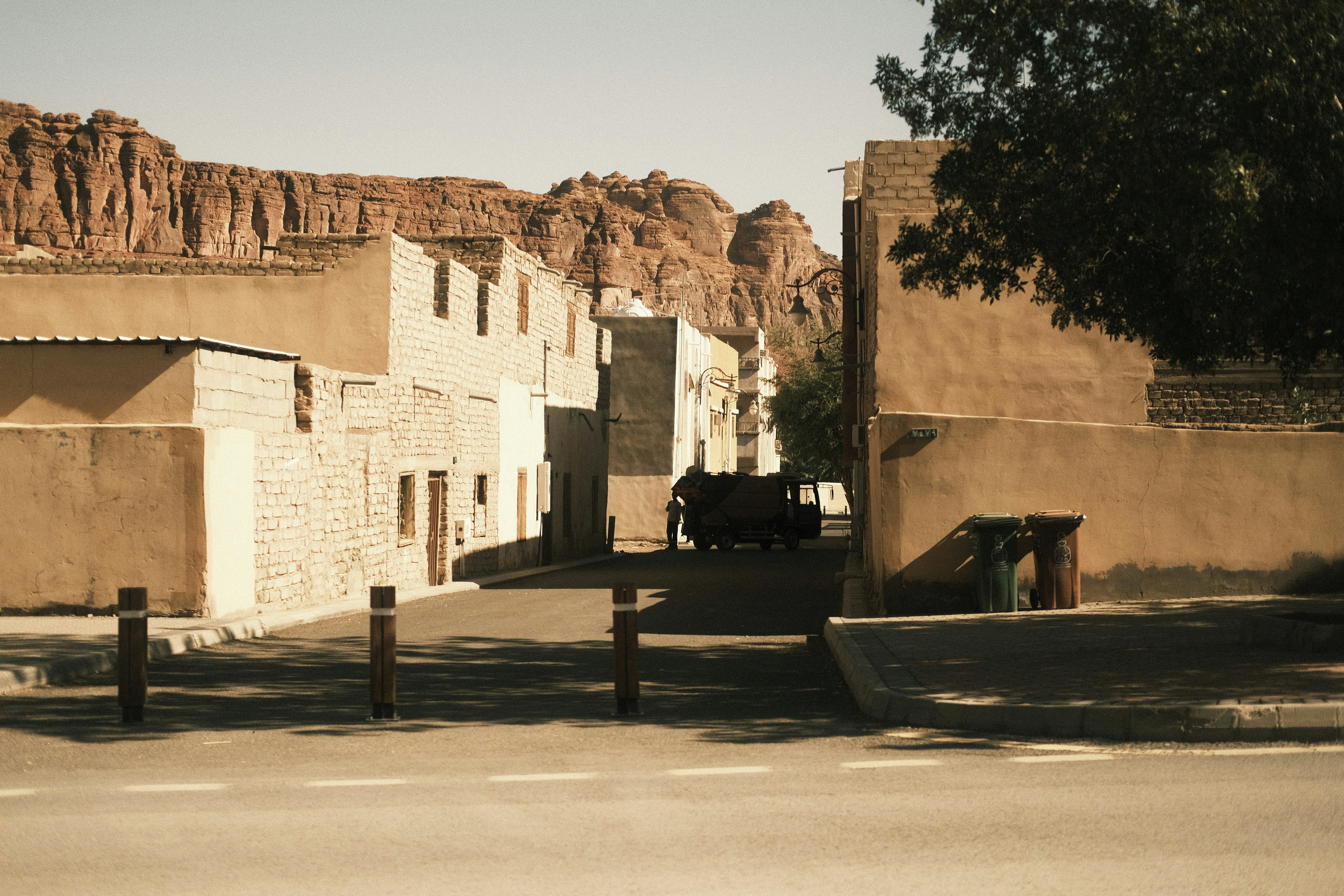 Historic stone buildings and sandstone cliffs in AlUla, Saudi Arabia