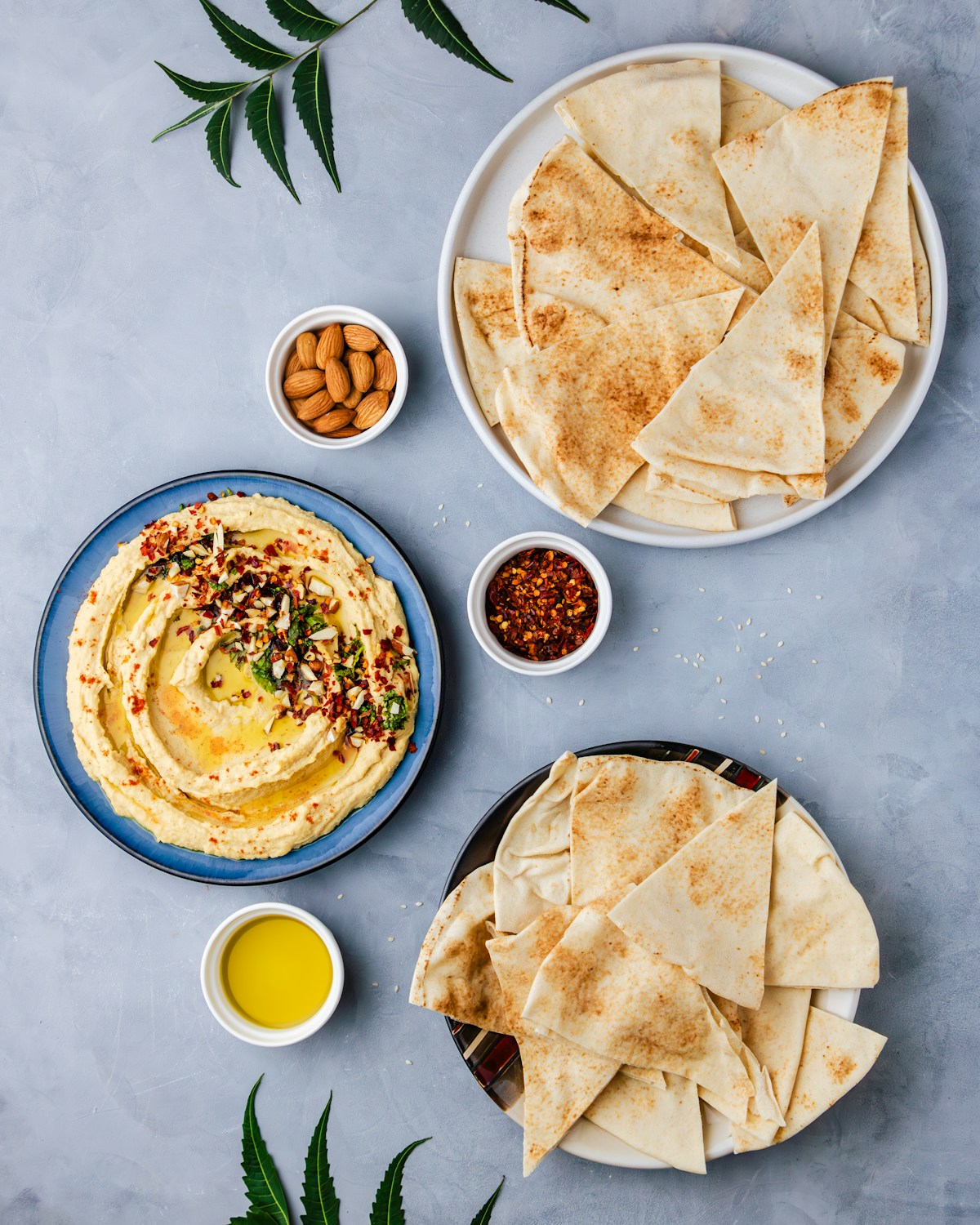 Hummus and pita flatbread - a staple of Saudi cuisine available on food tours in Riyadh