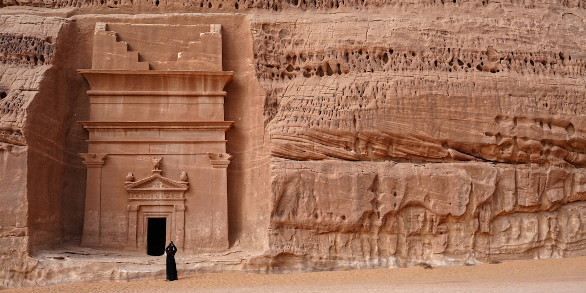 Ancient Nabataean tomb carved into sandstone at Hegra, AlUla, Saudi Arabia