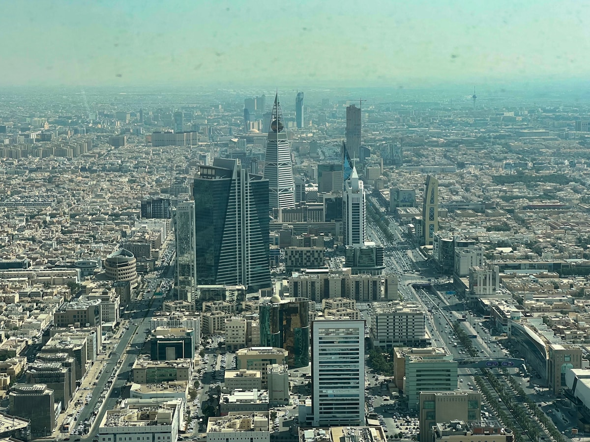Aerial view of Riyadh city centre with Kingdom Centre Tower and skyscrapers, Saudi Arabia