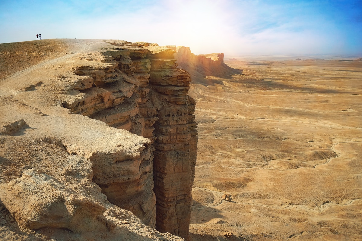 The Edge of the World escarpment at sunset - 300-metre cliffs dropping to the desert floor near Riyadh