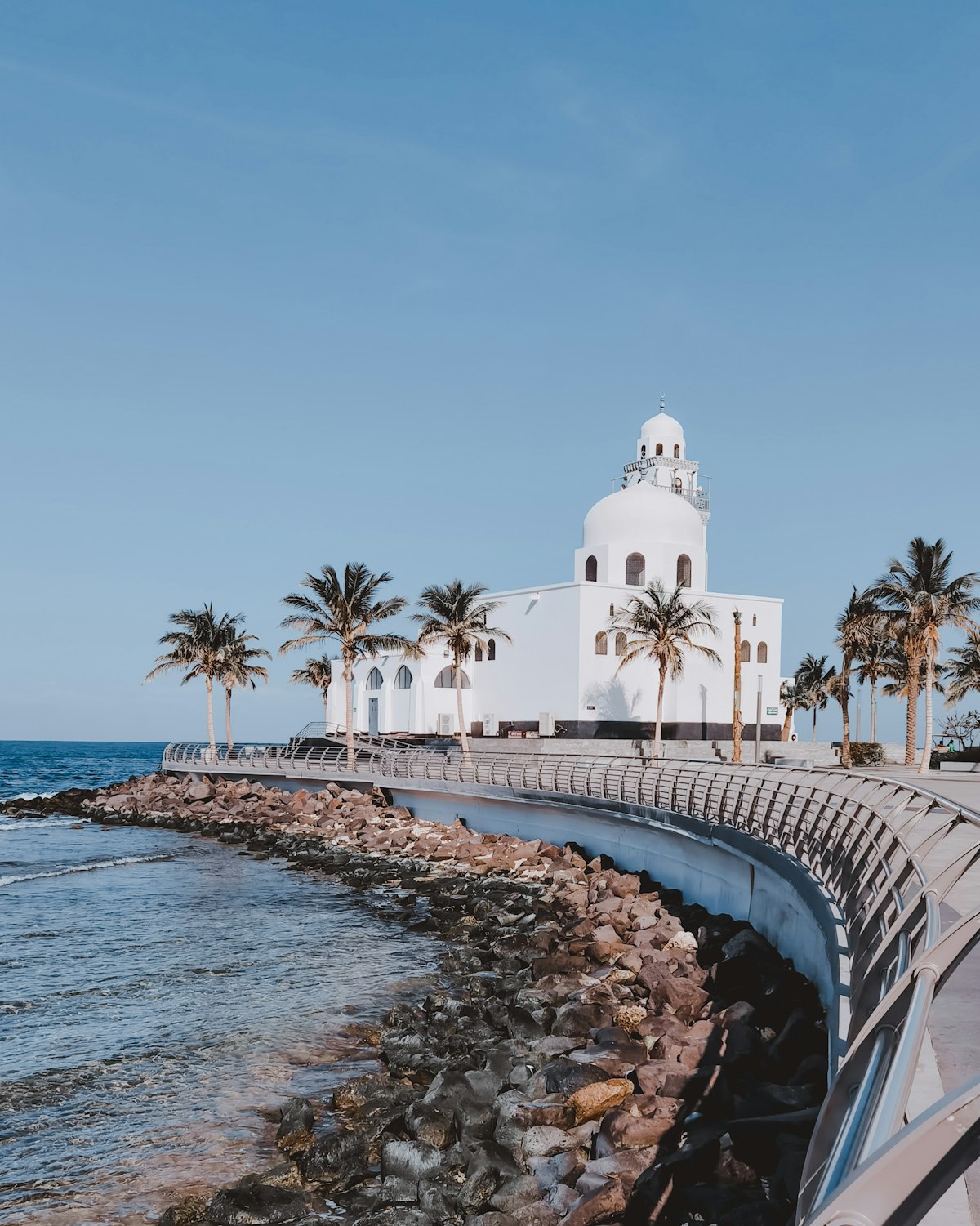 The Floating Mosque on the Jeddah Corniche with palm trees and the Red Sea