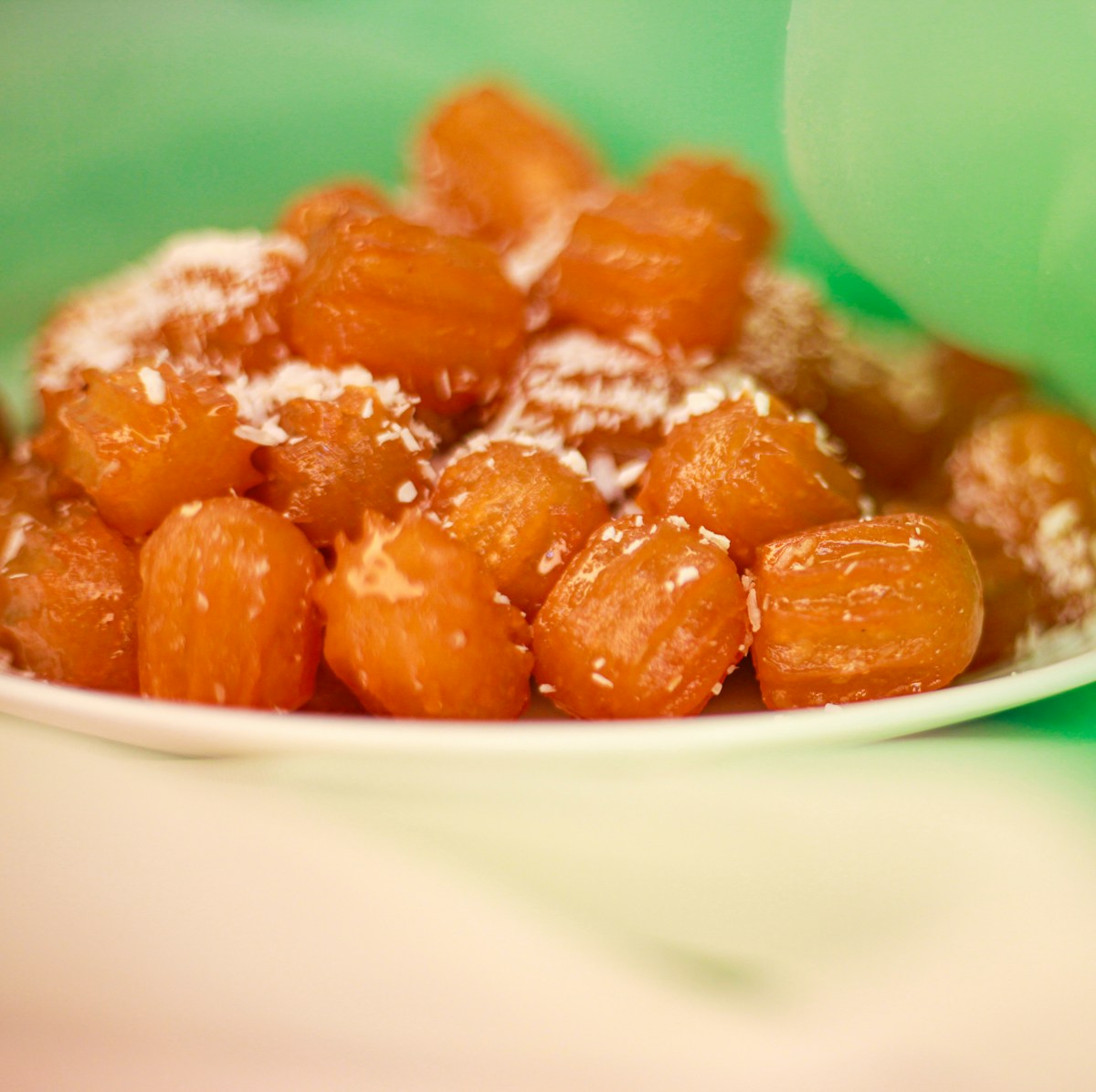 Luqaimat - crispy fried dough balls with syrup - a popular Saudi street dessert found in Taif